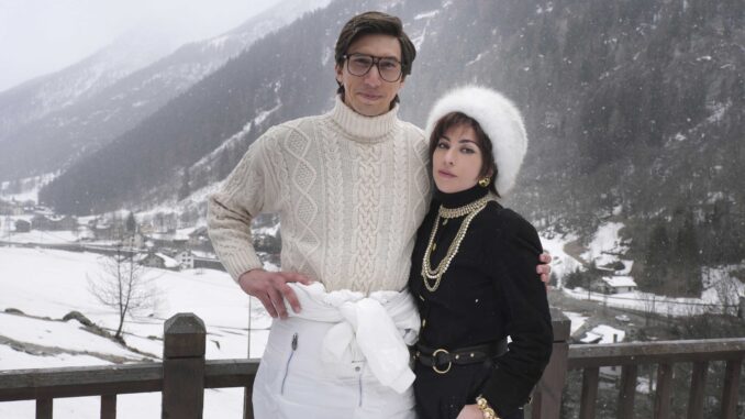 HOUSE OF GUCCI Adam Driver (Maurizio Gucci) and Lady Gaga (Patrizia Reggiani) in HOUSE OF GUCCI. Signore e Signora Gucci. A film about the tumultuous Gucci family fashion dynasty and the murder of founder Guccio Gucci’s grandson Maurizio Gucci. Image courtesy of MGM.